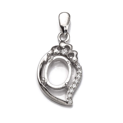 Pendant with Cubic Zirconia Inlays and Oval Mounting and Bail in Sterling Silver 7x9mm