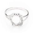 Ring with Cubic Zirconia Inlays and Oval Prongs Mounting in Sterling Silver 7x9mm