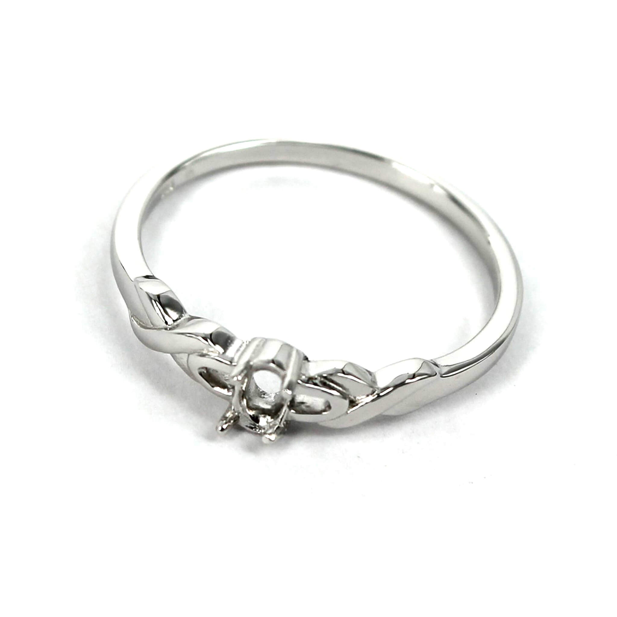 Twisted Cross-Over Ring with Oval Prong Mounting in Sterling Silver for 3x5mm Stones