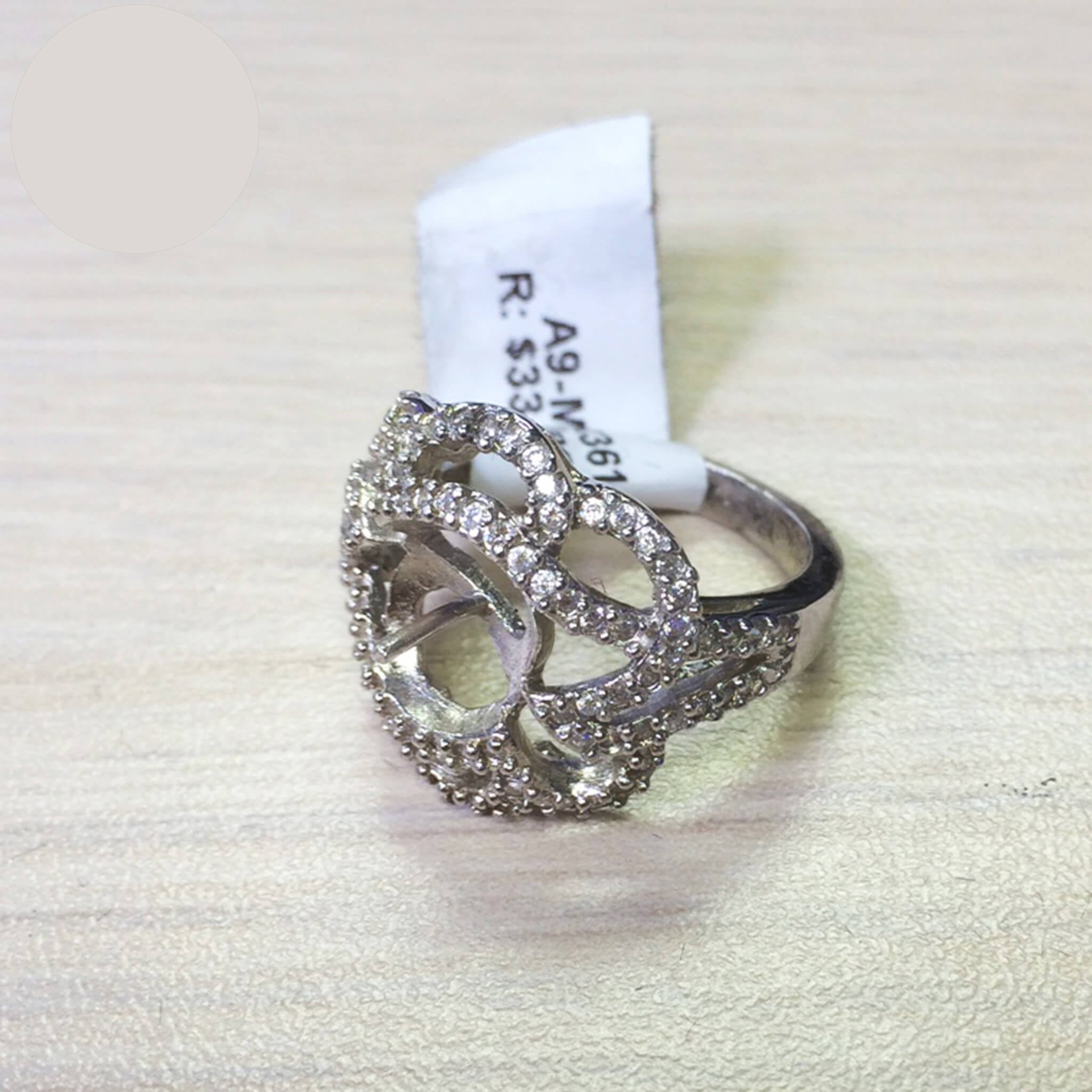 Unique Floral Ring with Cubic Zirconia Inlays and Cup and Peg Mounting in Sterling Silver 9mm
